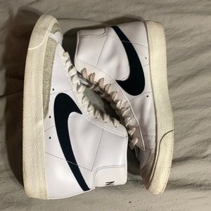 Nike Blazers Size 9.5, VERY good condition, although slightly worn.